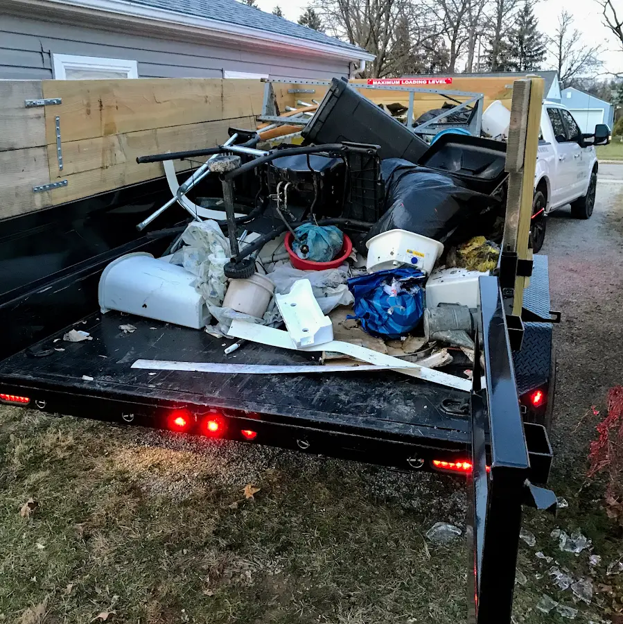 Roll-off dumpster delivered to a residential driveway in Pilot Point